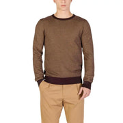 Brown textured sweater with ribbed cuffs and hem, likely made of cotton or wool.