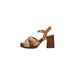 Brown leather platform sandal with gold accents showcased in a product image