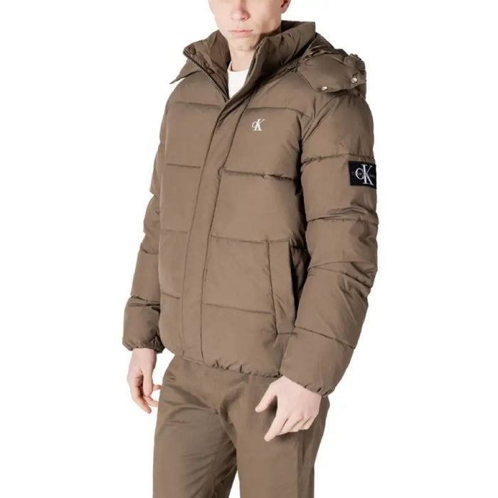 Brown puffer jacket with hood, perfect for stylish winter warmth and comfort