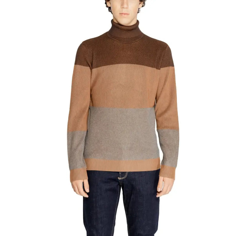 Brown and gray striped turtleneck sweater with ribbed knit texture, likely made of wool or cotton blend.