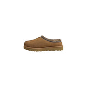 Brown suede UGG slipper featuring patterned trim for comfortable indoor wear