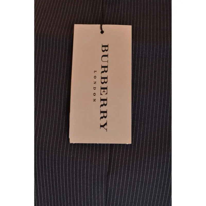 Costume homme Burberry en laine mohair à fines rayures blanches et étiquette beige Burberry London.