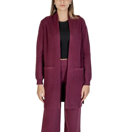Burgundy knit cardigan and pants set featured in Clerè Women’s Purple Knit Sweater