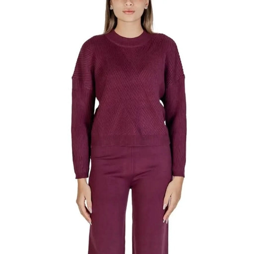 Burgundy knit sweater and pants set displayed as Purple Women’s Knitwear Sweater with Round Neck