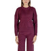 Burgundy knit sweater and pants set displayed as Purple Women’s Knitwear Sweater with Round Neck