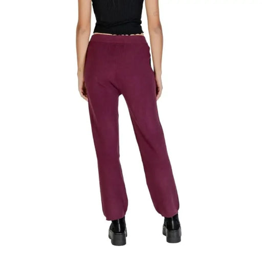 Burgundy sweatpants with elastic cuffs and front pockets from CLERÈ Women’s collection
