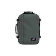 Valise cabine zéro gris foncé avec poignées et sangles noires, vue de l'arrière, en polyester.