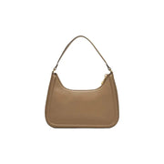Beige polyurethane calvin klein handbag with zip closure featuring a curved top handle and gold-tone zipper