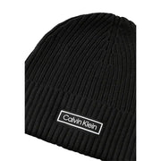 Black ribbed calvin klein beanie with white logo.