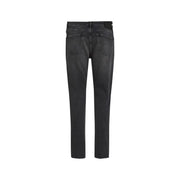 Black leather pants with distressed details and a slim fit.