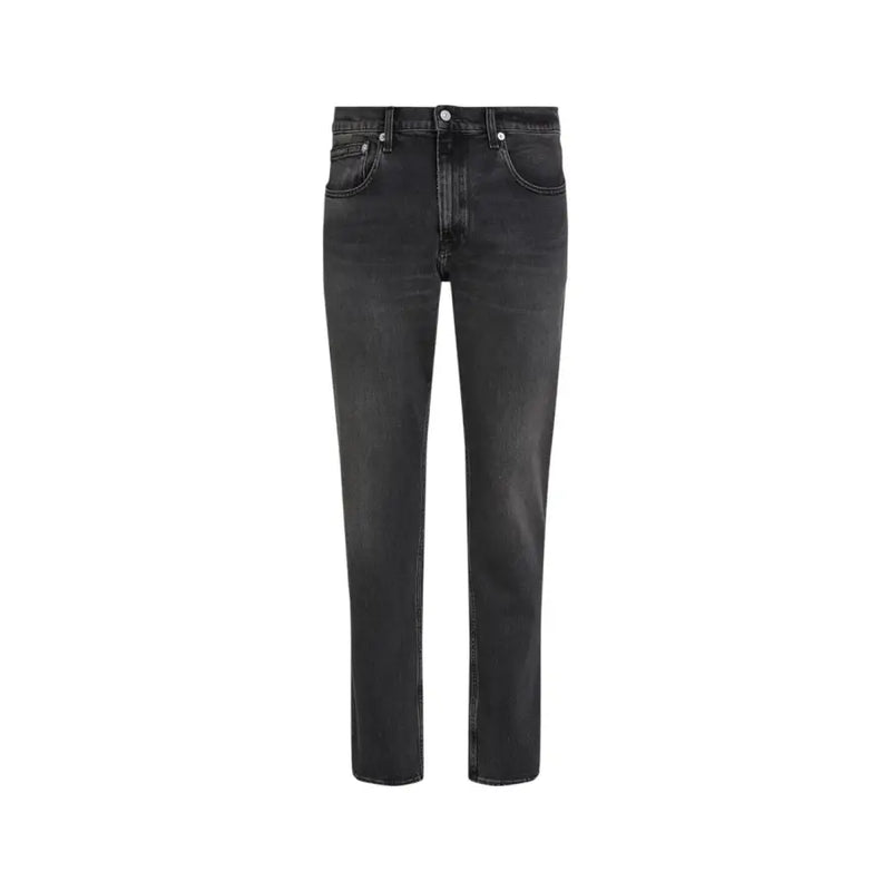 Black slim fit jeans with a distressed look and button fly design.