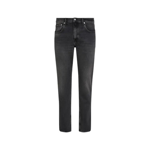 Black slim fit jeans with a distressed look and button fly design.