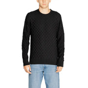 Black quilted sweater with a textured pattern and crew neck.