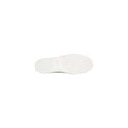 White rubber sole with textured pattern and subtle branding on calvin klein black leather slip on sneakers for women