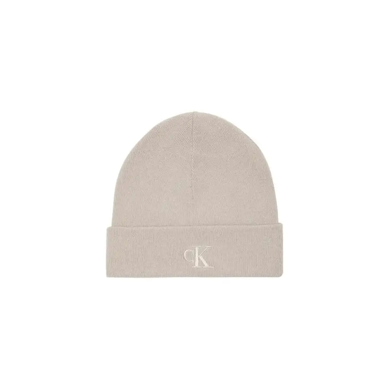 Calvin klein beige beanie with embroidered logo.