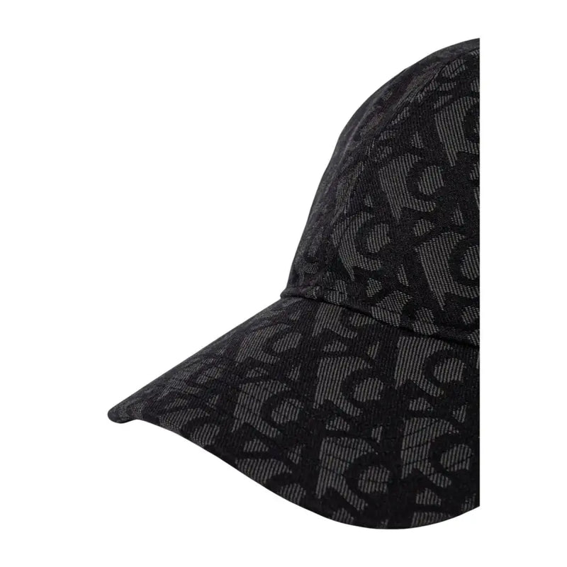 Black and gray monogrammed baseball cap with adjustable strap.
