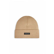 Beige calvin klein beanie with textured pattern and logo label.