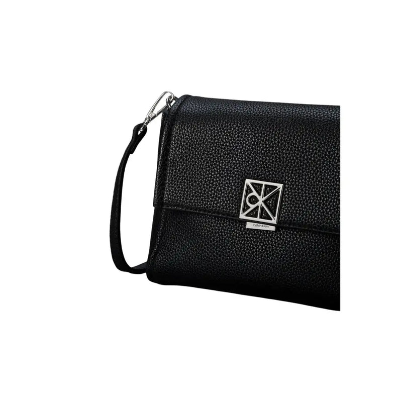 Calvin Klein black textured leather crossbody bag with silver-tone logo clasp and adjustable shoulder strap