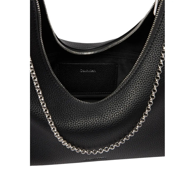 Black textured leather Calvin Klein hobo bag with silver chain strap and zip pocket for stylish daily use