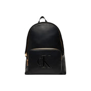 Calvin Klein black rucksack with gold-tone zipper pockets and prominent ck logo on front pocket