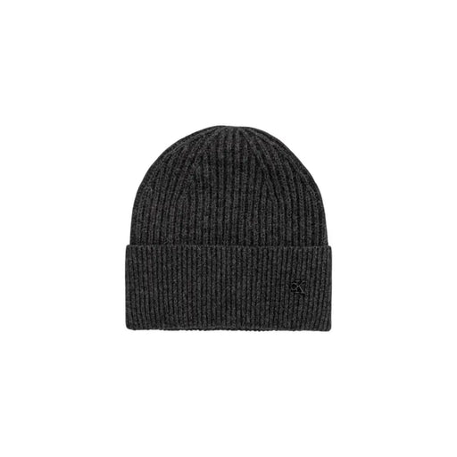 Charcoal gray ribbed beanie with calvin klein logo.