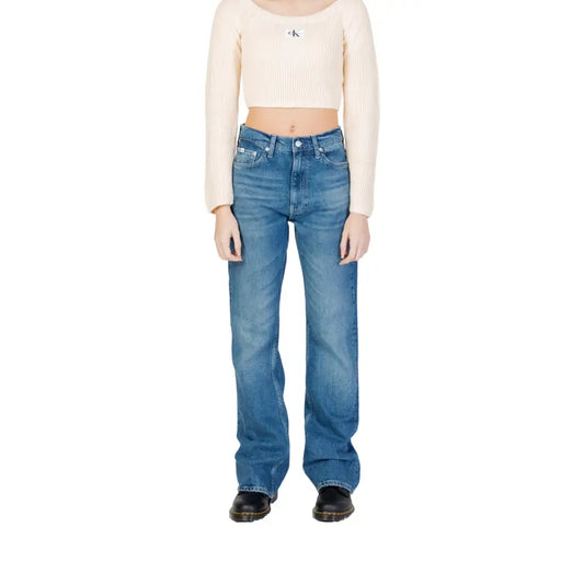 Calvin Klein blue women’s denim jeans with classic five-pocket design and faded worn-out effect in cotton material