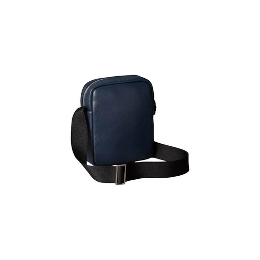Calvin Klein Sac bandoulière Raised Reporter pour femme en cuir texturé bleu marine avec bandoulière noire réglable, vue de face