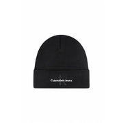 Black calvin klein beanie with white logo and text.