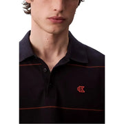Black polo shirt with red and white stripes, calvin klein logo.
