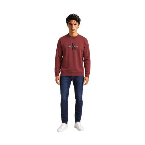 Calvin Klein Jeans Pull en coton bordeaux pour homme, avec logo CK noir et inscription Calvin Klein, vue de face