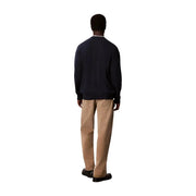 Calvin Klein Jeans Pull en coton bleu marine pour homme, à côtes et bordure blanche au col, vue de face