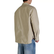 Calvin Klein Jeans Blazer beige en coton pour homme, coupe classique, manches longues, fermeture boutonnée, col classique et détails de coutures.