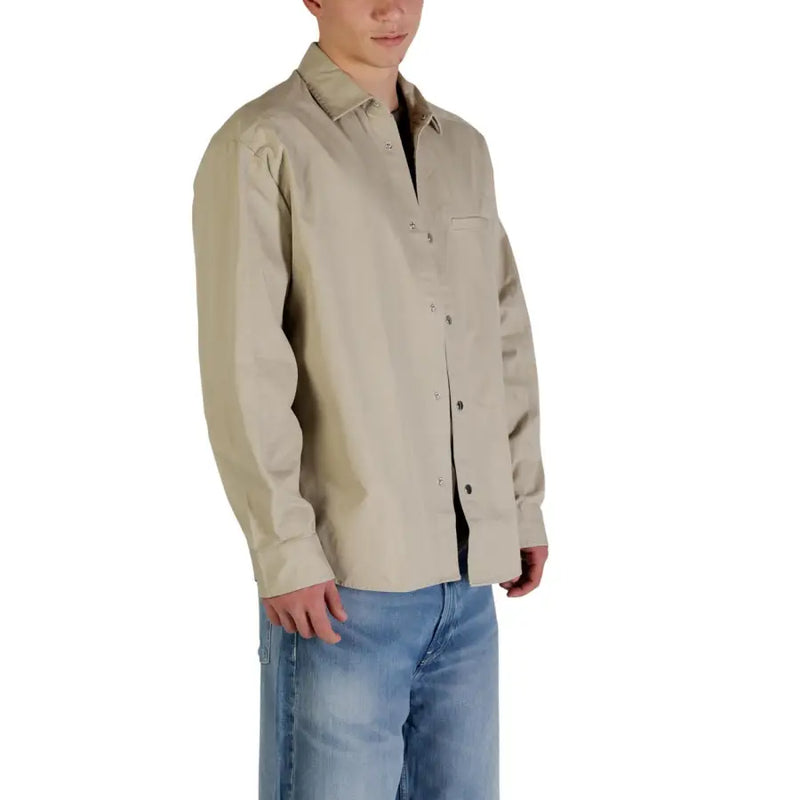 Calvin Klein Jeans Chemise homme beige en coton, manches longues, col et poche poitrine, coupe classique
