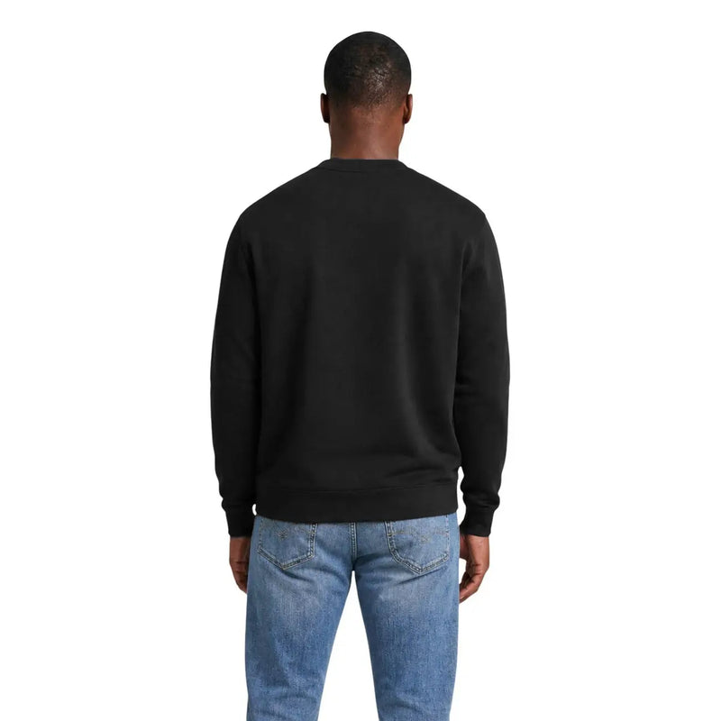 Calvin Klein Jeans men black cotton long-sleeved crewneck sweatshirt showing the front side