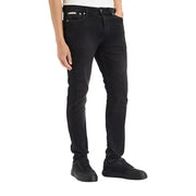 Calvin Klein Jeans Jean slim en denim de coton noir pour homme, coupe slim moderne et délavage subtil pour un look contemporain