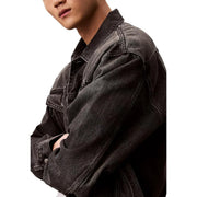 Calvin Klein Jeans Veste homme en coton noir, coupe classique, denim foncé, surpiqûres classiques et délavage texturé.