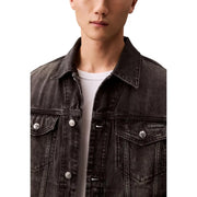 Veste en jean noir délavé pour homme Calvin Klein Jeans, en coton, avec boutons argentés et écusson logo sur la poitrine gauche.