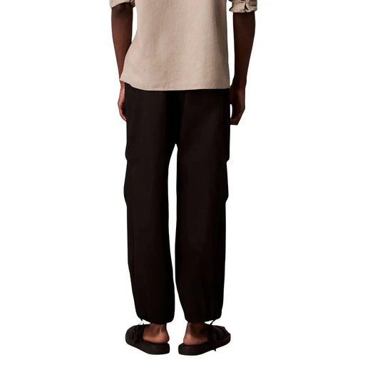 Calvin Klein Jeans Pantalon noir pour homme en coton et nylon, jambes larges, coupe droite décontractée