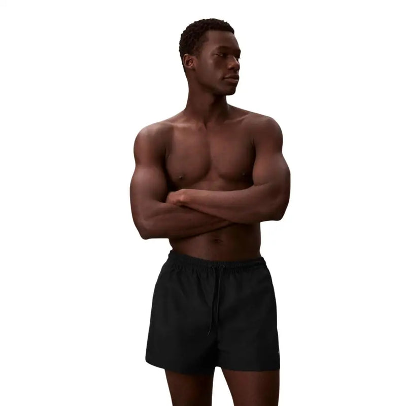 Calvin Klein Jeans Short de bain noir pour homme en polyester avec ceinture à cordon pour un confort optimal