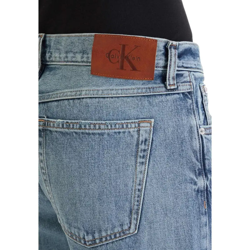 Jean en denim délavé, vue de dos, avec empiècements en cuir marron Calvin Klein écusson de marque classique en coton 100%
