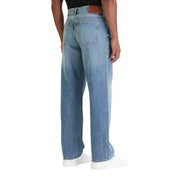 Jean Calvin Klein pour homme, bleu clair, coupe classique et décontractée, jambes larges, 100 % coton, avec étiquette en cuir marron à la taille.