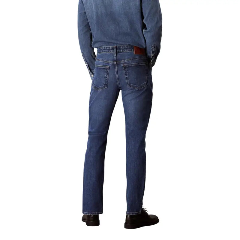 Calvin Klein Jeans Jean en denim de coton bleu pour homme, coupe droite classique et passant de ceinture en cuir marron