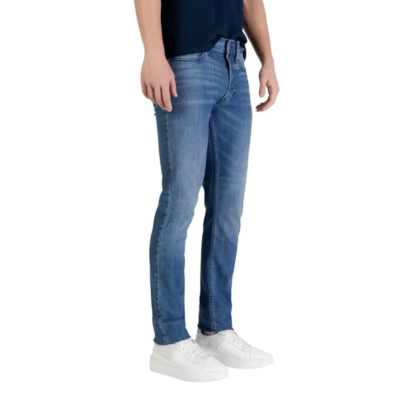 Calvin Klein Jean slim pour homme en denim bleu coton avec un délavage subtil.