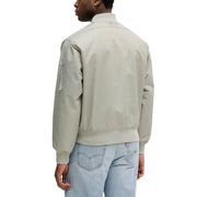 Calvin Klein Jeans Blazer zippé vert en polyamide pour homme, col côtelé beige clair style bomber et poche zippée sur la manche