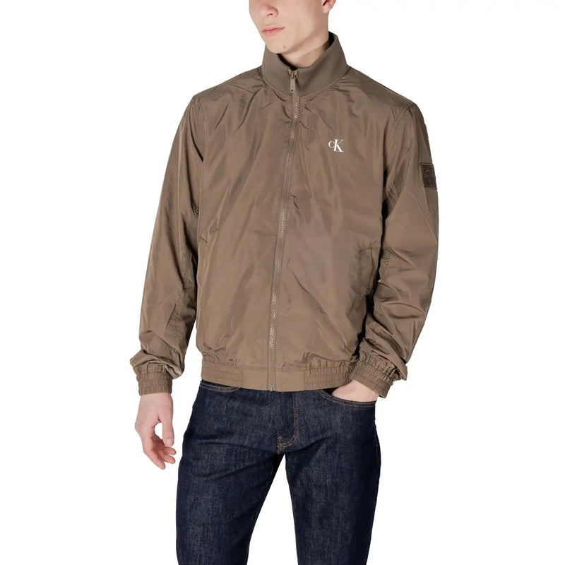 Brown Calvin Klein jacket with subtle sheen and small white logo on chest in long polyamide zip blazer style