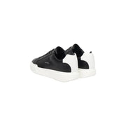 Calvin Klein Jeans Baskets en cuir noir pour homme, avec une tige en cuir élégant, une semelle en caoutchouc blanc et un logo discret sur le côté.