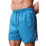 Calvin Klein Jeans Short de bain homme bleu clair en polyester avec taille élastique et cordon de serrage assorti