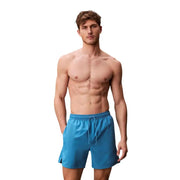 Calvin Klein Jeans Short de bain homme bleu clair en polyester avec ceinture à cordon bleu vif pour la natation