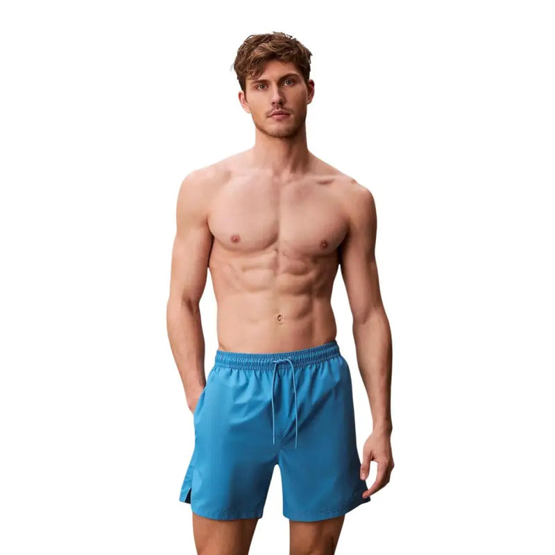 Calvin Klein Jeans Short de bain homme bleu clair en polyester avec ceinture à cordon bleu vif pour la natation