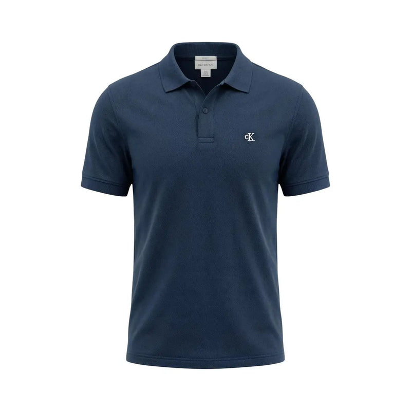 Navy blue textured cotton short sleeve polo shirt by Calvin Klein Jeans with white CK logo on left chest size L
